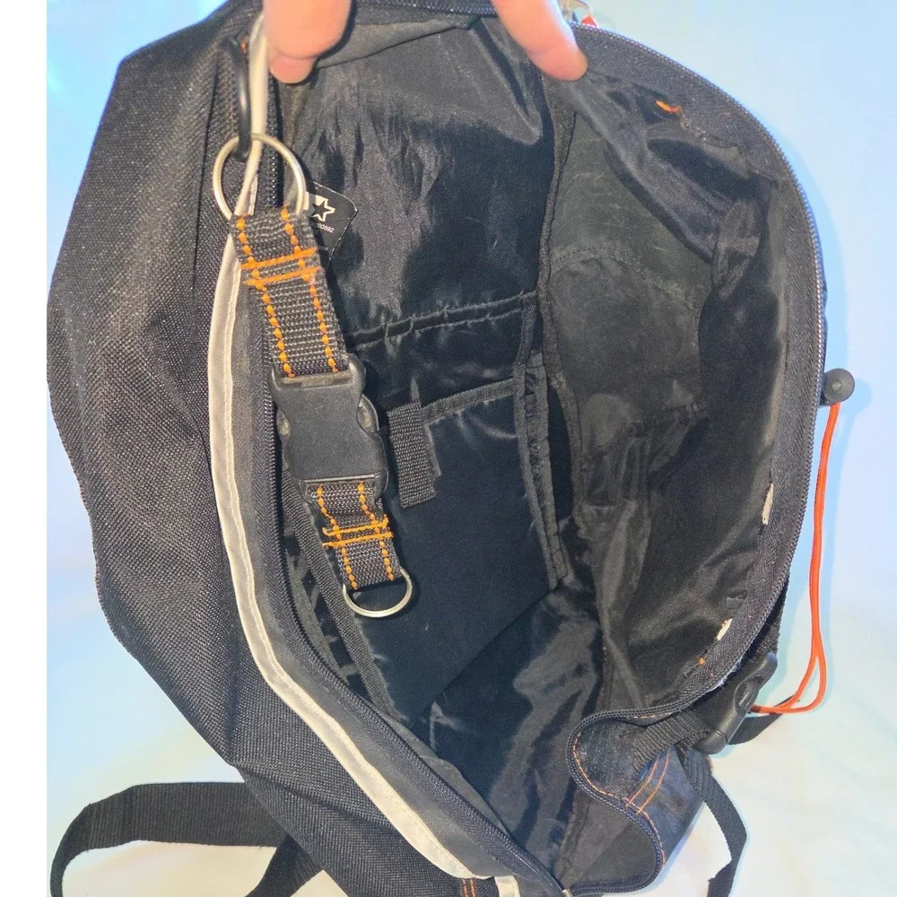 Starter Sling Backpack Black Reflective Orange Stitch Bungee Bag